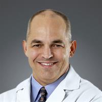 portrait of Chris Alan Clark, MD, FAAFP