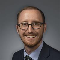 portrait of Justin Pesek, MD